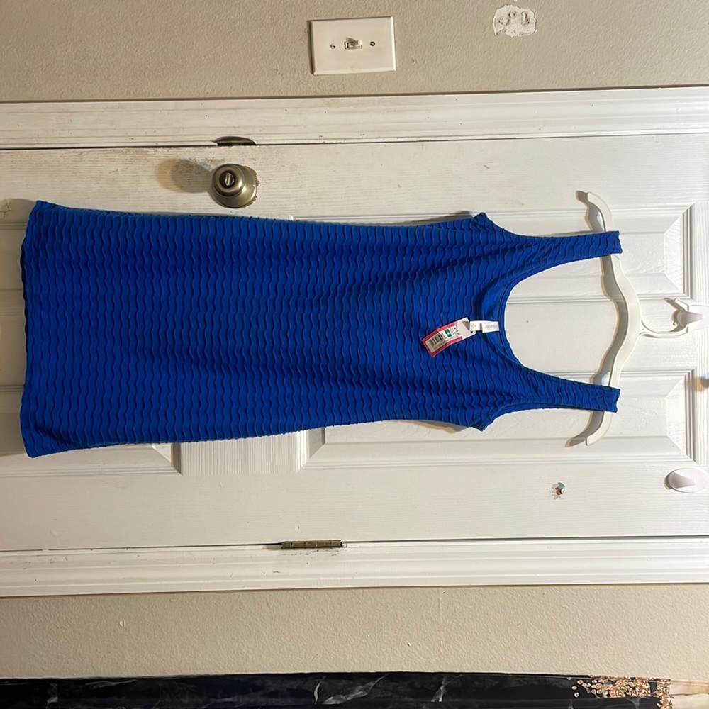 super cute never been worn.. new with tags..blue dress size medium
